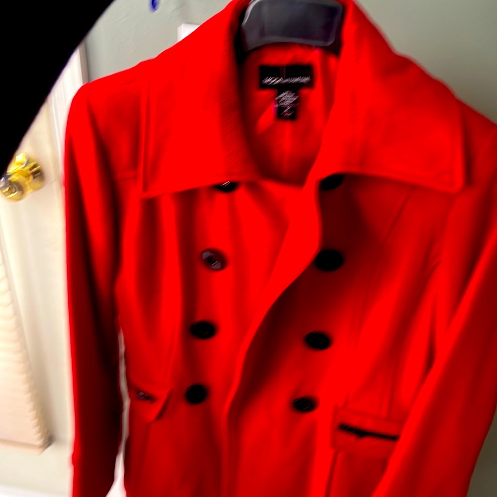 Red size Medium stylish coat.   Worn once.